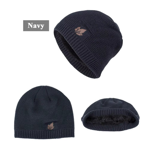 Navy knit beanie with a logo on a white background