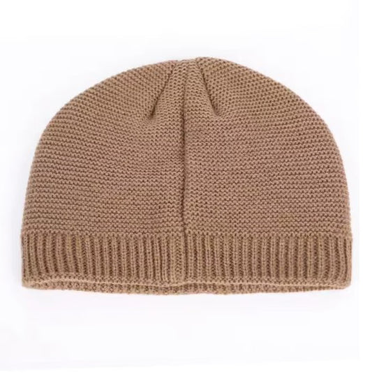 Khaki knitted beanie on a white background