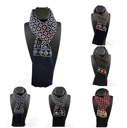 Set of patterned scarves on black mannequin stands against a white background