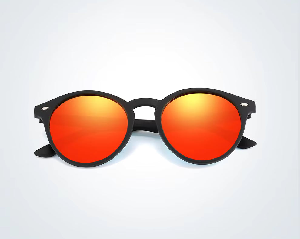 Sunglasses with orange lenses and black frames on a white background