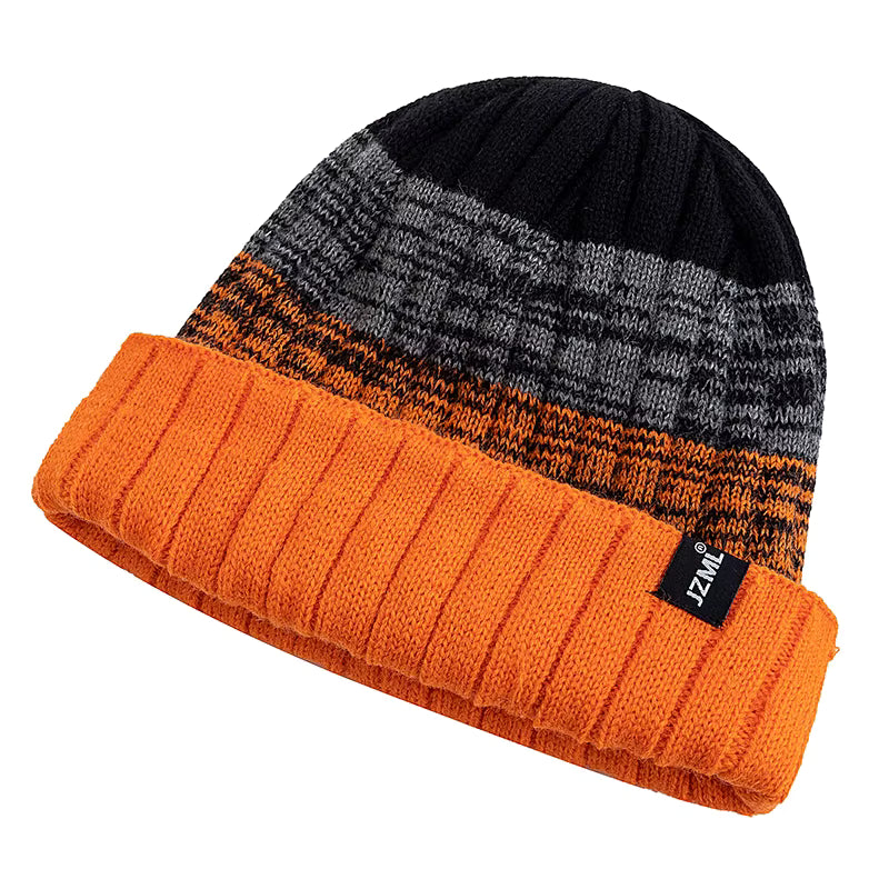 Knitted beanie with black, gray, and orange pattern on a white background