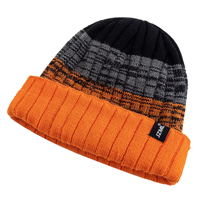 Knitted beanie with black, gray, and orange pattern on a white background
