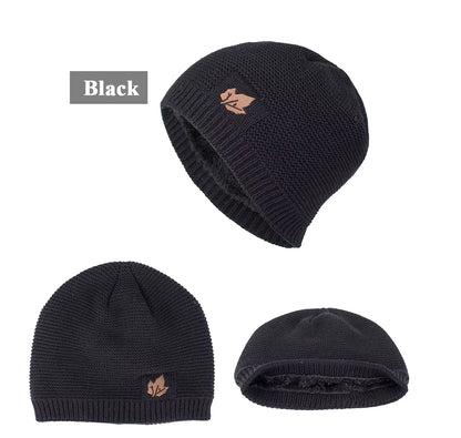 Black knit beanie with a logo on a white background