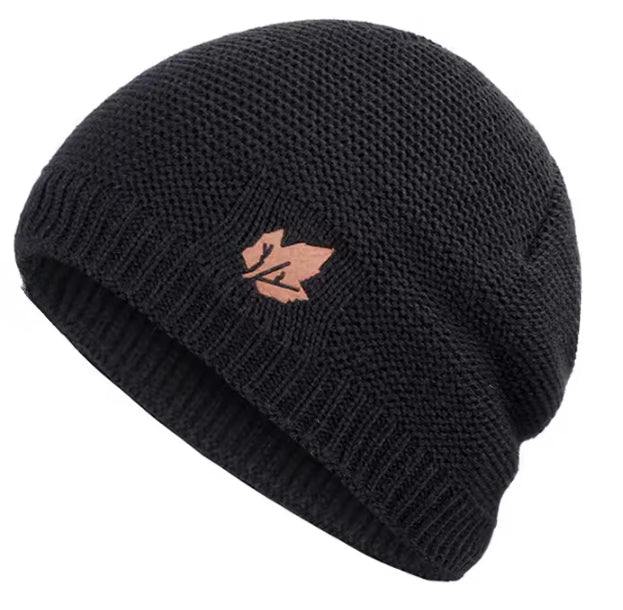 Black knit beanie with a rose gold logo on a white background