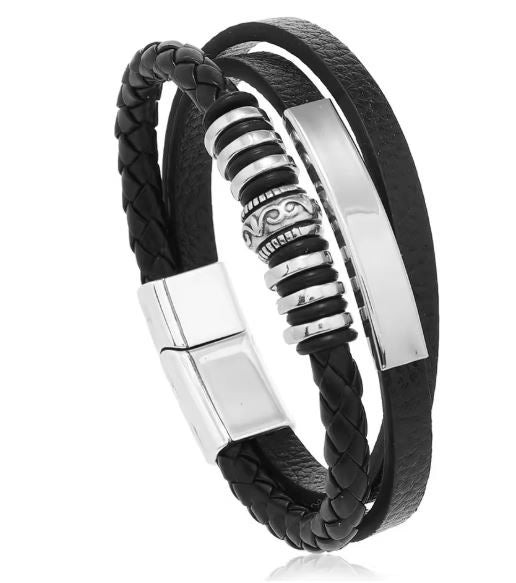Black braided leather bracelet with silver metal accents on a white background