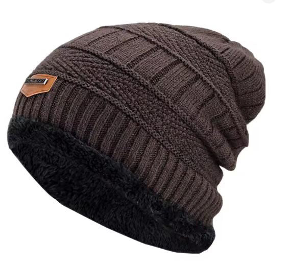 Brown knitted beanie with black cuff on a white background