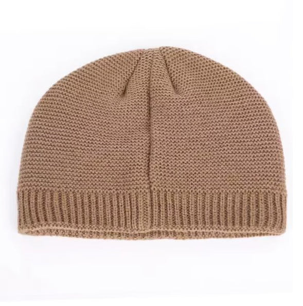 Khaki knitted beanie on a white background