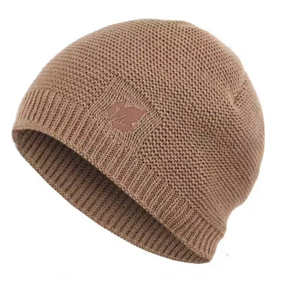 Khaki knit beanie with a logo on a white background