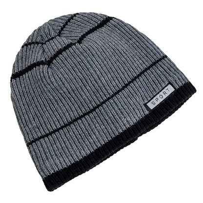 Grey beanie with black stripes and a brand label on a white background