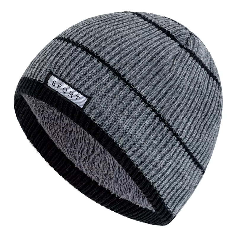 Grey beanie with black accents and 'Sport' label on a white background