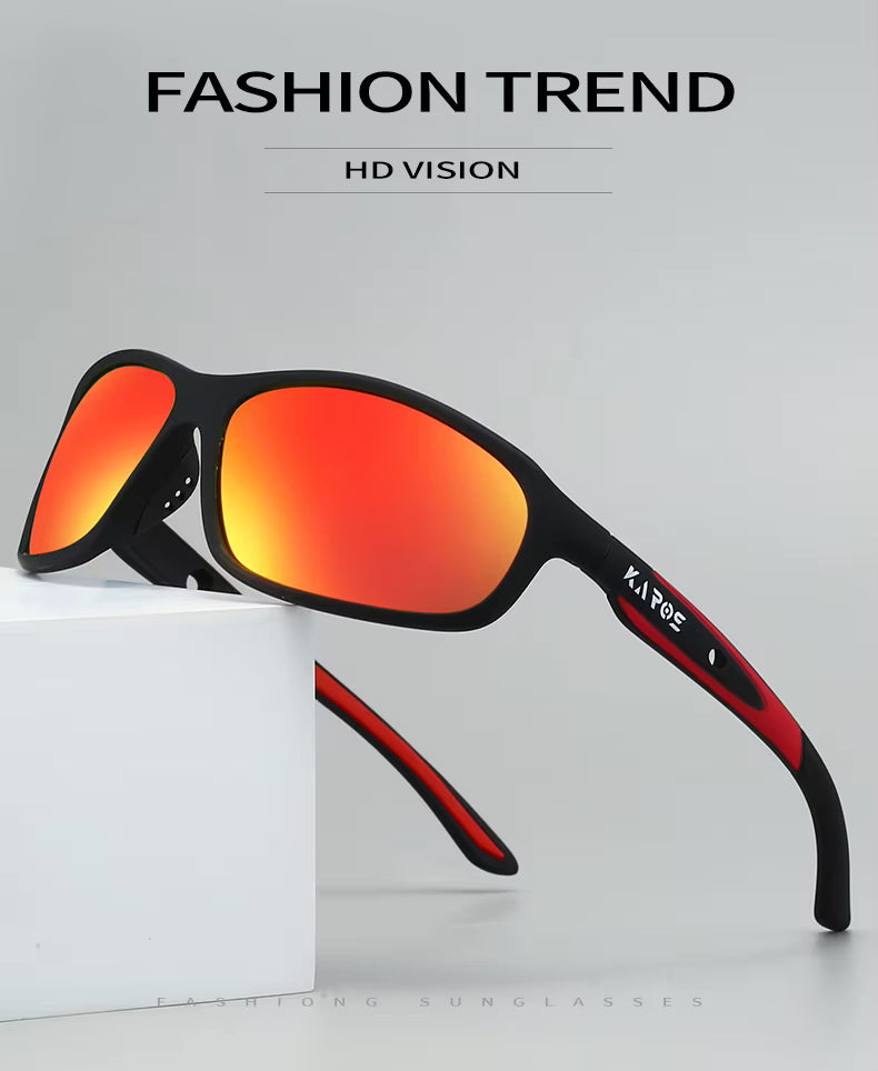 Sunglasses with black frame and red-orange lenses on a light gray background, labeled 'Fashion Trend' and 'HD Vision'.