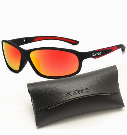 Sunglasses with red lenses and black frame, accompanied by a black case on a white background.
