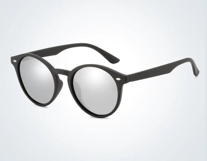 Black round sunglasses with reflective lenses on a light gray background