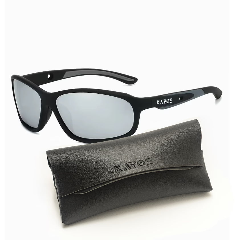 Black sunglasses with silver lenses and a matching case on a white background