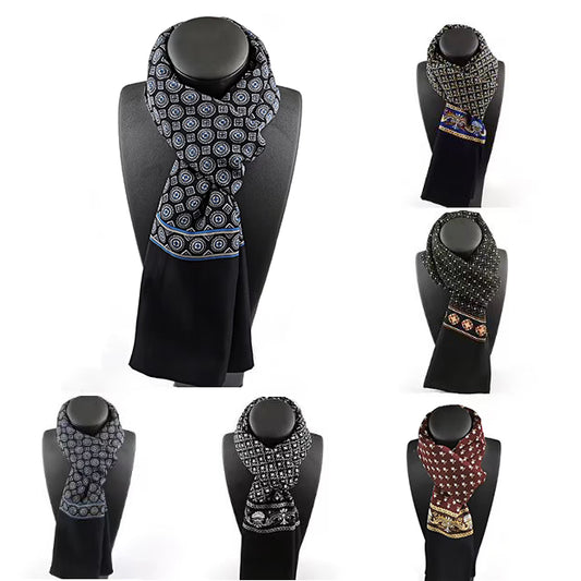 Collection of patterned scarves on black mannequin stands against a white background