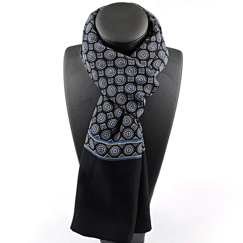 Patterned scarf on a mannequin with a white background