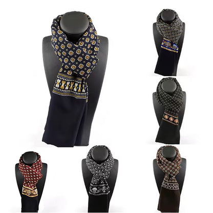 Collection of patterned scarves on black mannequin stands against a white background