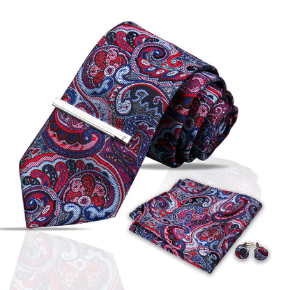 Paisley patterned tie, pocket square, and cufflinks on a white background
