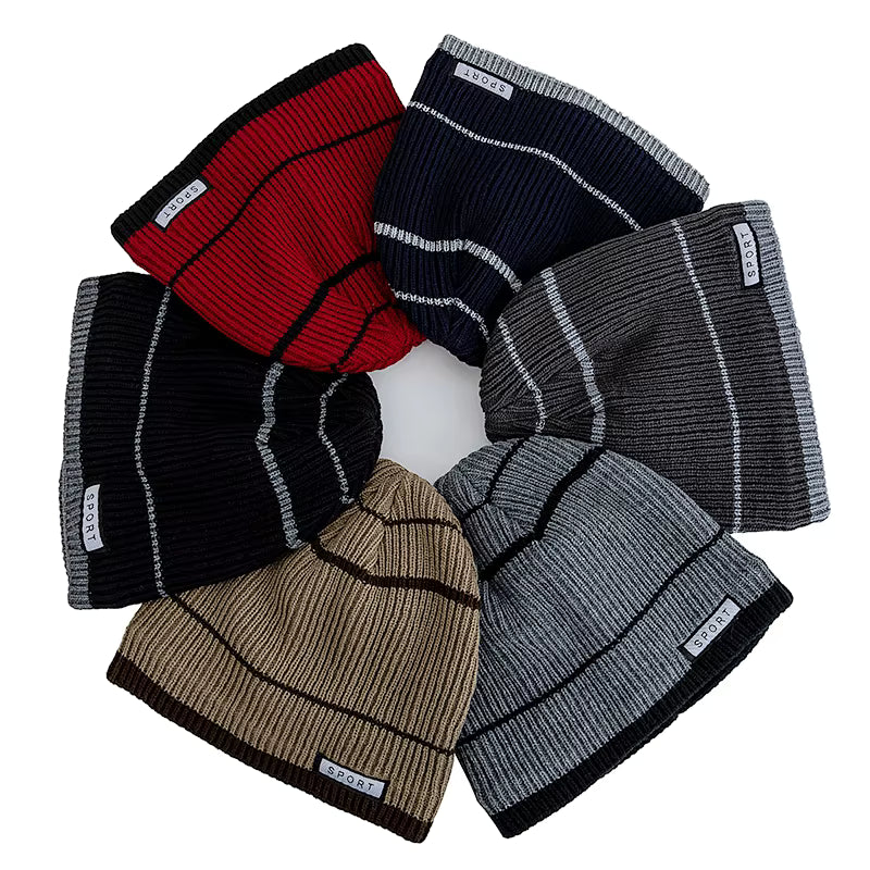 Set of knit beanies in various colors on a white background