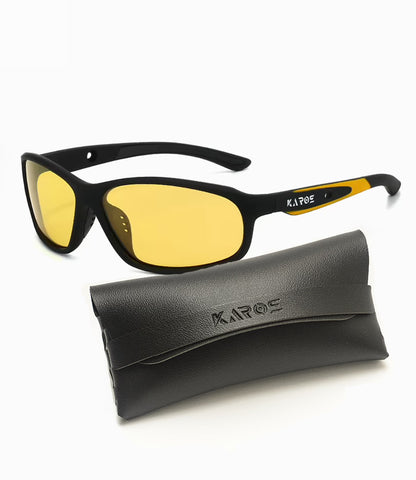 Black sunglasses with yellow lenses and a black case on a white background